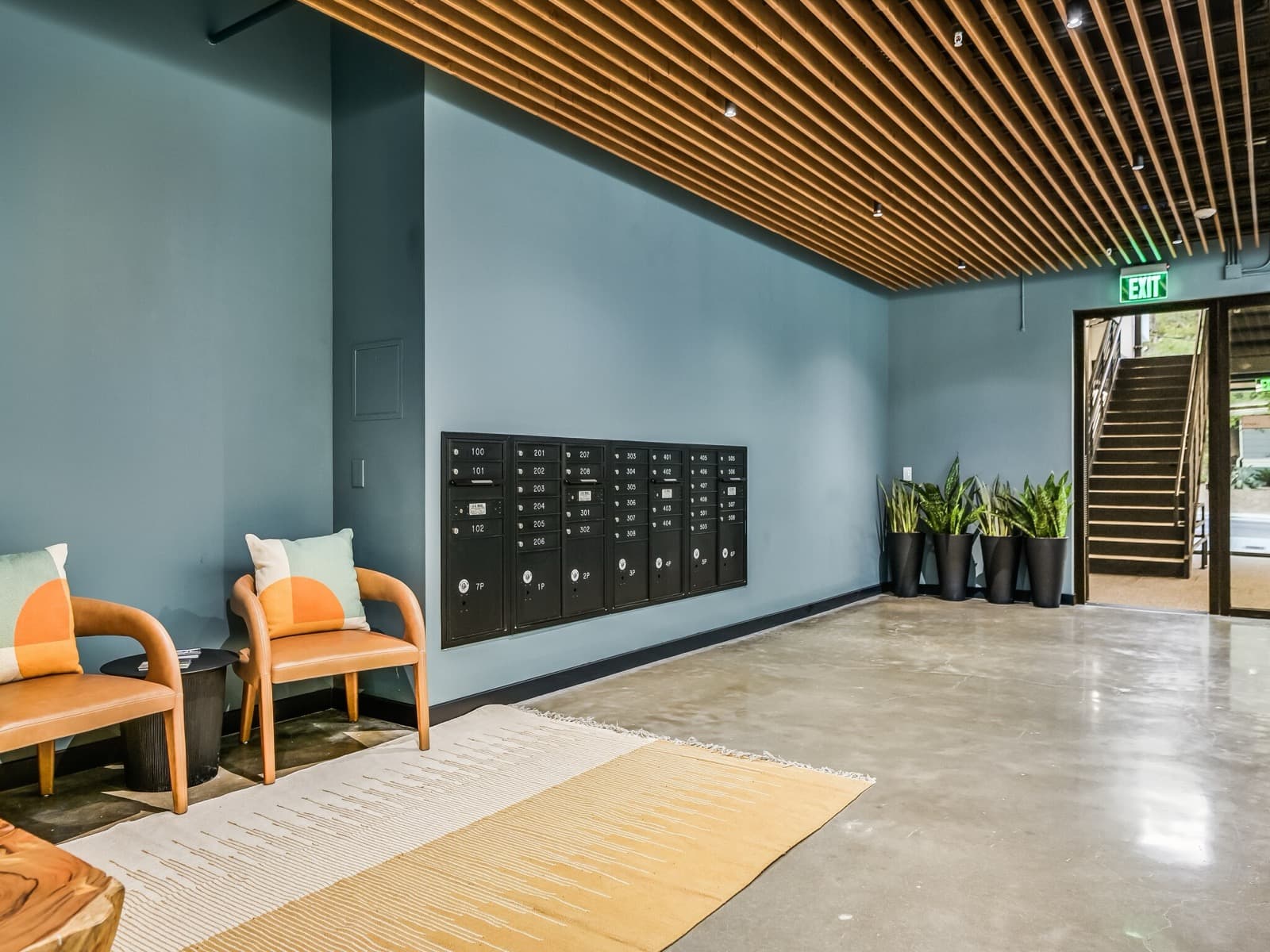 Capitol Living lobby and secure mail area with polished concrete floors