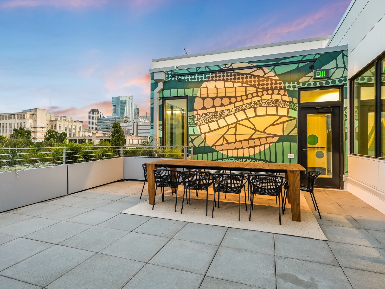 Rooftop terrace at Capitol Living overlooking downtown Austin skyline
